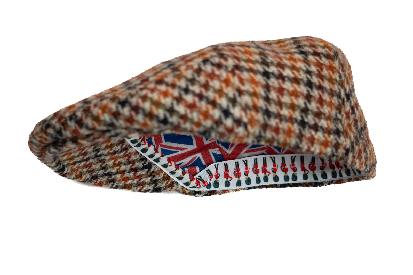 Houndstooth patterned cap with Union Jack design on a white background