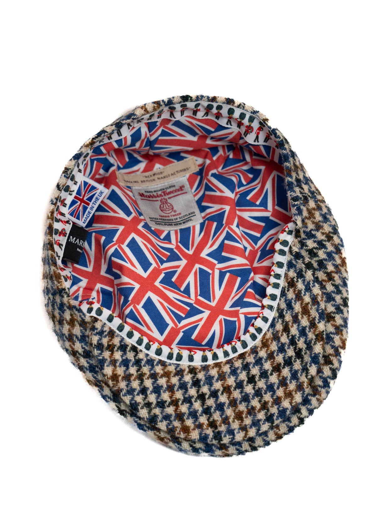 Houndstooth patterned hat with Union Jack design on a white background