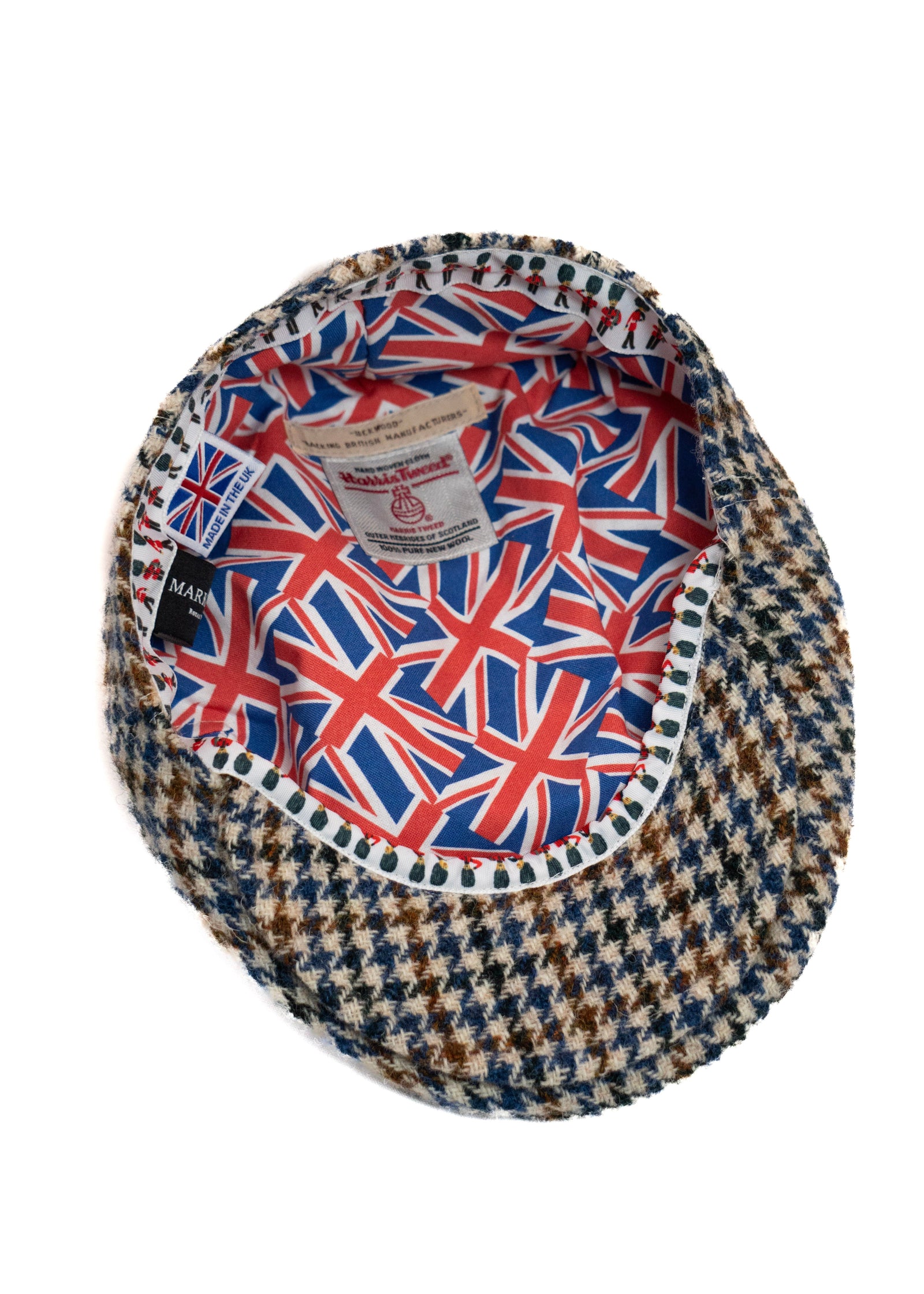 Houndstooth patterned hat with Union Jack design on a white background