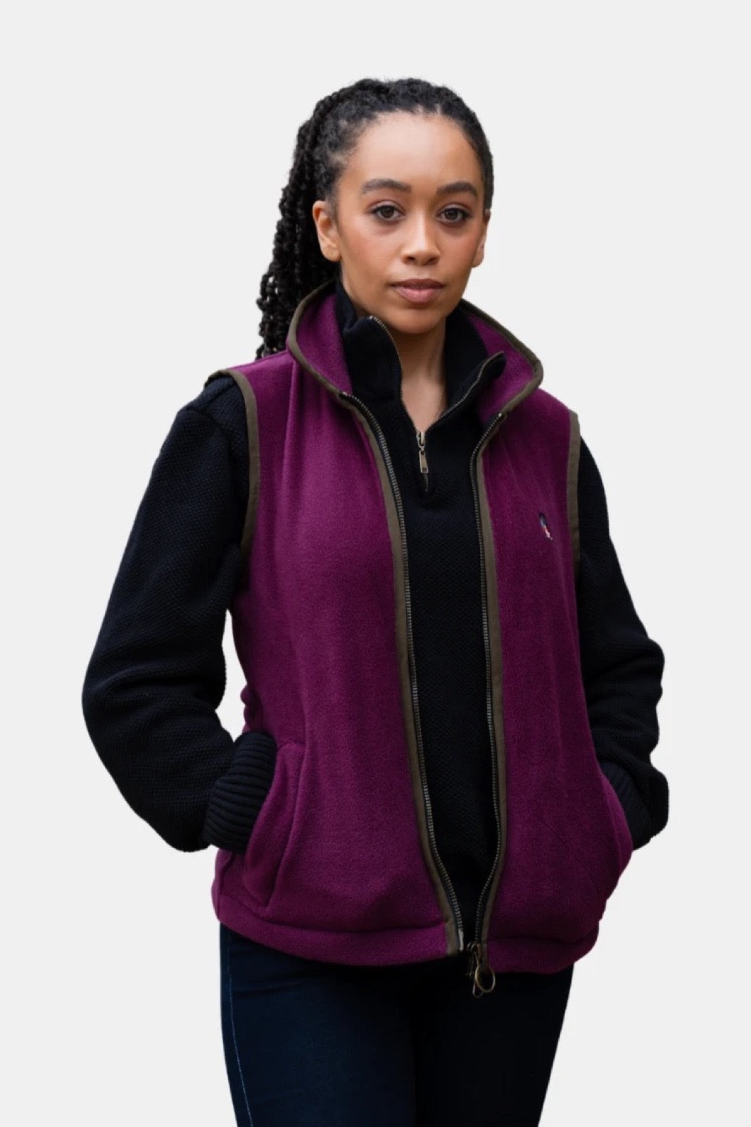 Woman wearing the Lockwood Ladies’ Victoria plum fleece gilet, front view